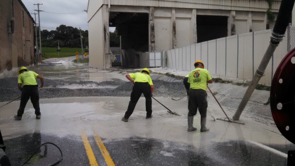 men cleaning up wastewater